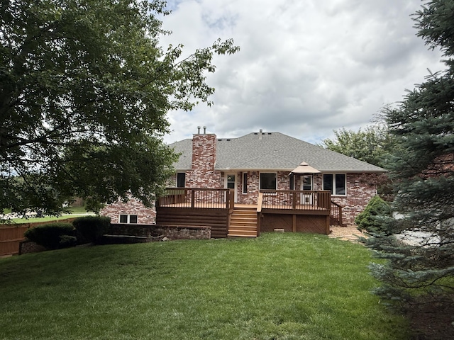 5135 S Clay Ave, Springfield, MO 65810 - rear view of house with a lawn, a deck, a chimney, and roof with shingles