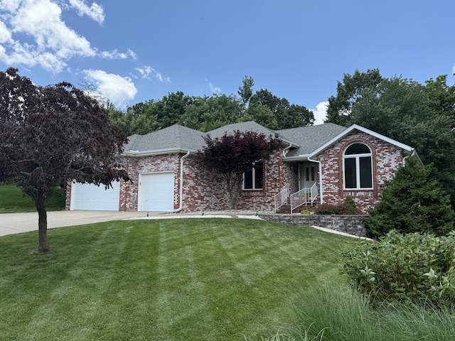 5135 S Clay Ave, Springfield, MO 65810 - ranch-style home featuring driveway, a garage, a front lawn, and brick siding