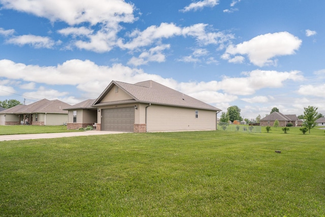 1054 Thoroughfare St, Seymour, MO 65746 - view of side of property featuring a garage, brick siding, and driveway