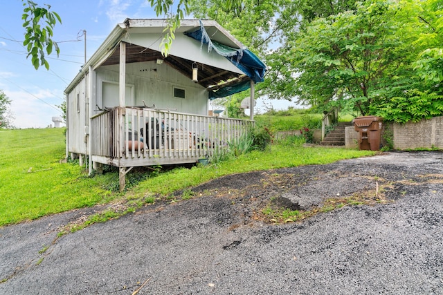 1408 Rockhill Cir, Ozark, MO 65721 - view of side of property with a deck