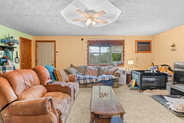 1408 Rockhill Cir, Ozark, MO 65721 - carpeted living area with ceiling fan, a textured ceiling, and a wall mounted AC
