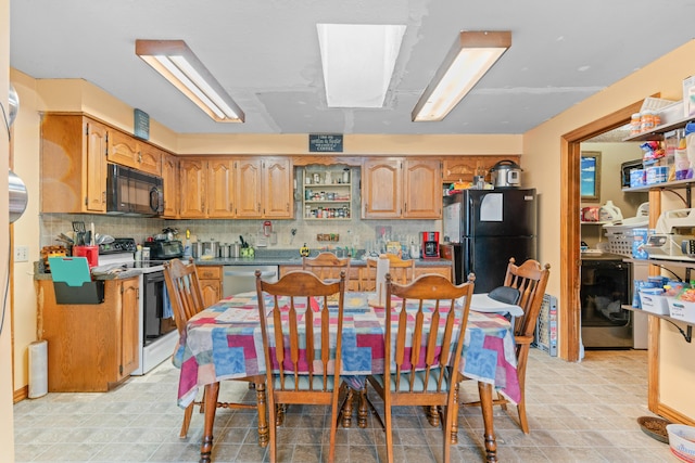 1408 Rockhill Cir, Ozark, MO 65721 - kitchen with black appliances, tasteful backsplash, open shelves, and brown cabinets