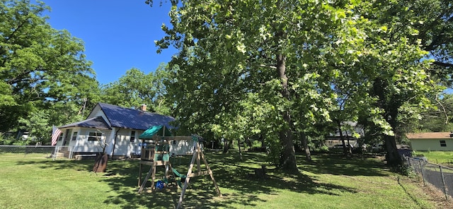 414 3rd St, Anderson, MO 64831 - view of yard with a playground and view of scattered trees