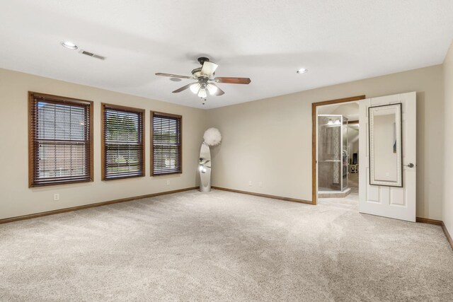 2421 Candlebark Ln, Lebanon, MO 65536 - spare room with light carpet, a ceiling fan, and recessed lighting