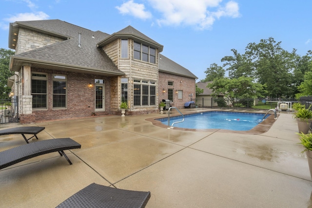 2421 Candlebark Ln, Lebanon, MO 65536 - view of swimming pool featuring a patio and a fenced backyard