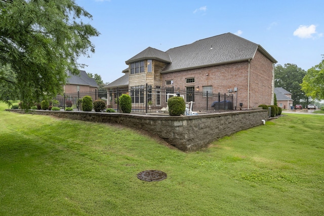 2421 Candlebark Ln, Lebanon, MO 65536 - rear view of house featuring brick siding