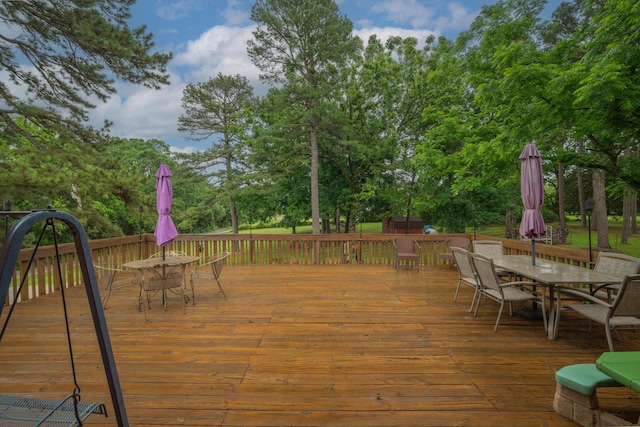 10703 Lawrence Unit 2230, Monett, MO 65708 - deck with outdoor dining area and view of scattered trees