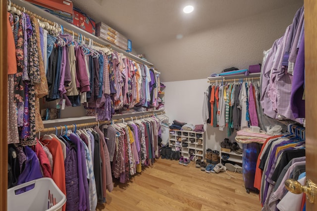 10703 Lawrence Unit 2230, Monett, MO 65708 - spacious closet featuring vaulted ceiling and wood finished floors