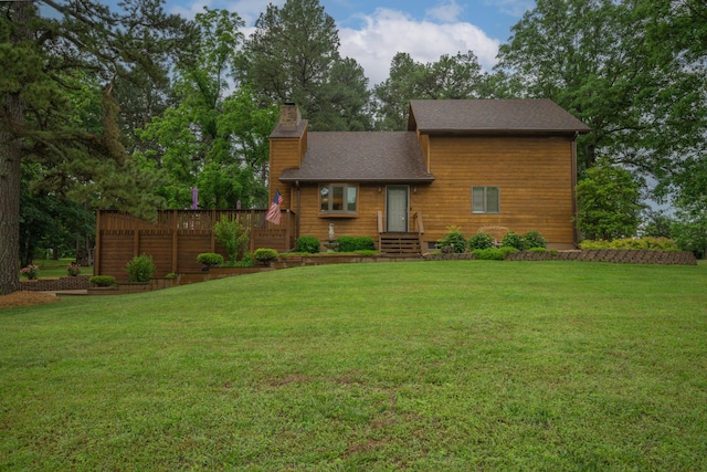 10703 Lawrence Unit 2230, Monett, MO 65708 - view of front facade with a chimney, a front lawn, roof with shingles, and a deck