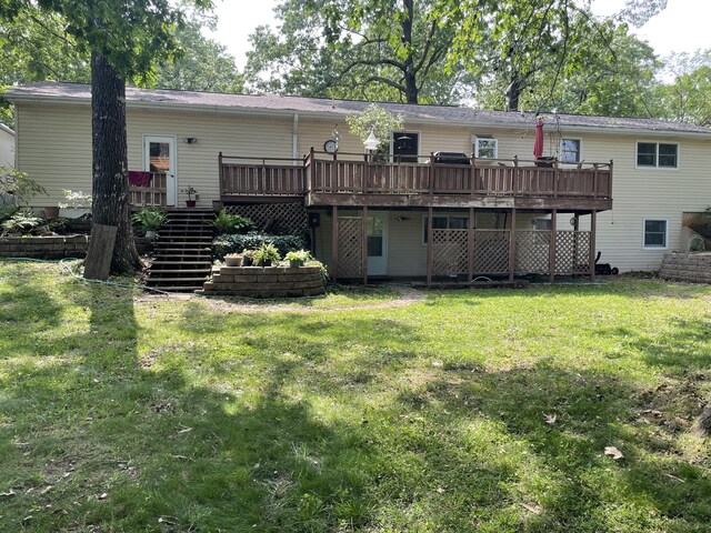 2704 Jennifer Dr, West Plains, MO 65775 - back of property featuring a deck, stairs, and a lawn
