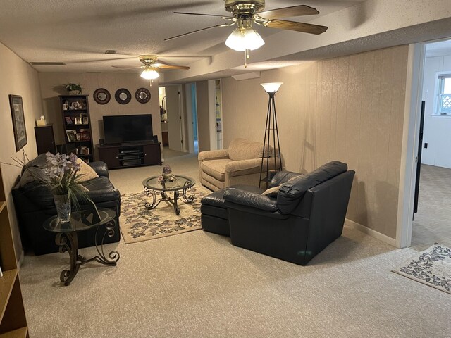 2704 Jennifer Dr, West Plains, MO 65775 - carpeted living area featuring a ceiling fan and a textured ceiling