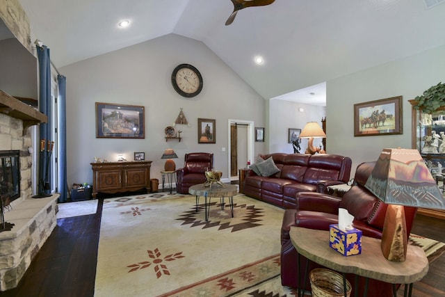 722 Seven Pines Dr, Saddlebrooke, MO 65630 - living room with a ceiling fan, wood finished floors, a stone fireplace, recessed lighting, and high vaulted ceiling