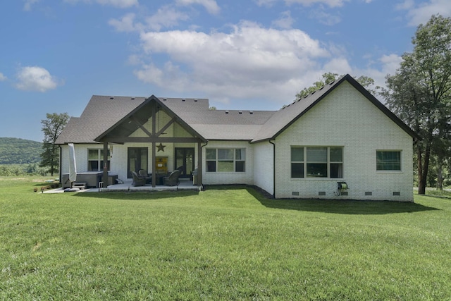 722 Seven Pines Dr, Saddlebrooke, MO 65630 - rear view of house featuring crawl space, a patio, a hot tub, brick siding, and a lawn