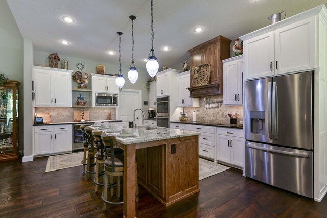 722 Seven Pines Dr, Saddlebrooke, MO 65630 - kitchen featuring stainless steel appliances, a sink, open shelves, wine cooler, and backsplash