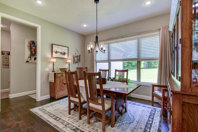 722 Seven Pines Dr, Saddlebrooke, MO 65630 - dining room with baseboards, dark wood finished floors, a chandelier, and recessed lighting