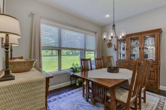 722 Seven Pines Dr, Saddlebrooke, MO 65630 - dining area with a chandelier, baseboards, wood finished floors, and recessed lighting