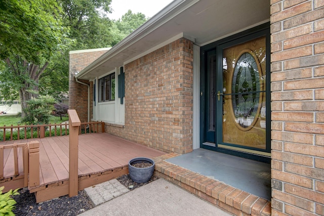 2117 E Wornall Pl, Springfield, MO 65804 - entrance to property with brick siding and a wooden deck
