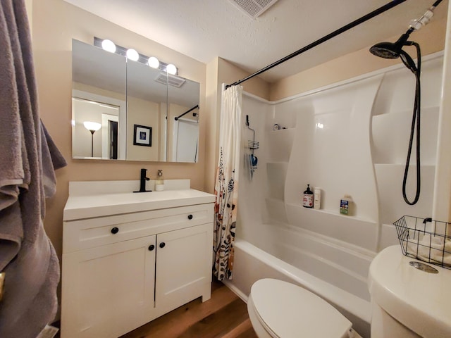 1010 Pine St, Cabool, MO 65689 - full bathroom with toilet, shower / bath combo, wood finished floors, and vanity