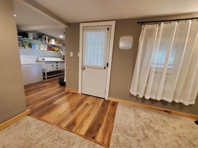 1010 Pine St, Cabool, MO 65689 - foyer featuring baseboards and wood finished floors