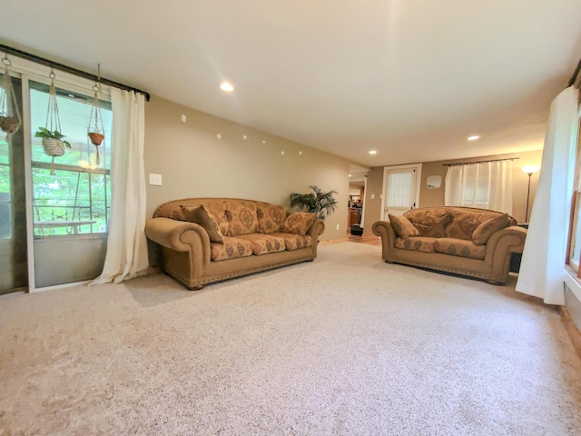 1010 Pine St, Cabool, MO 65689 - living room featuring recessed lighting, baseboards, and carpet