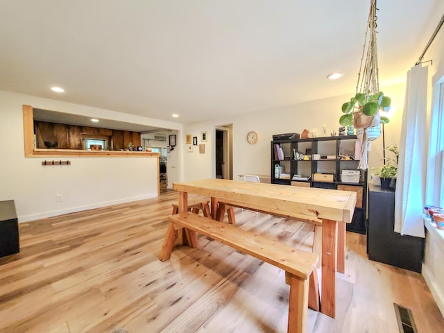 1010 Pine St, Cabool, MO 65689 - dining room featuring light wood-type flooring, recessed lighting, and baseboards