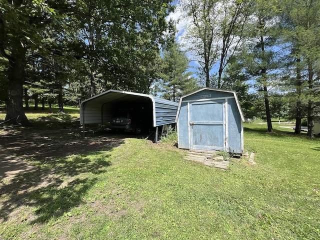 1010 Pine St, Cabool, MO 65689 - view of shed featuring a carport