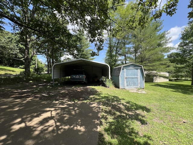 1010 Pine St, Cabool, MO 65689 - view of shed with a detached carport and driveway