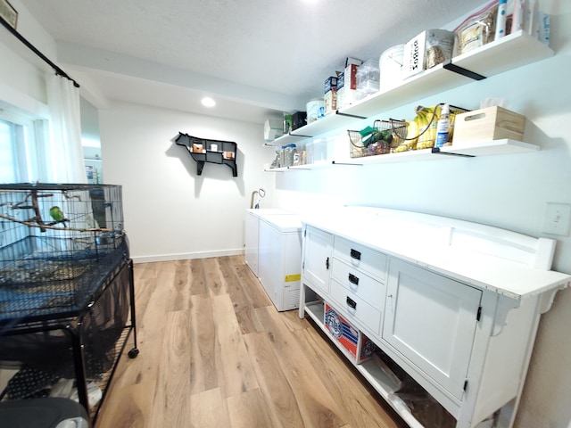 1010 Pine St, Cabool, MO 65689 - kitchen with open shelves, white cabinets, recessed lighting, light wood-style floors, and light countertops