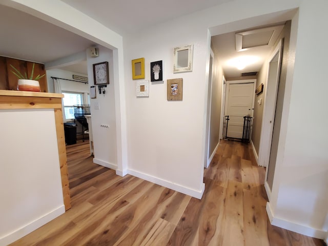 1010 Pine St, Cabool, MO 65689 - hall with attic access and light wood-type flooring