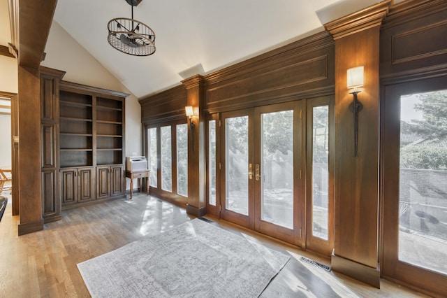 3596 E Montrose Ct, Springfield, MO 65809 - unfurnished sunroom featuring french doors and vaulted ceiling
