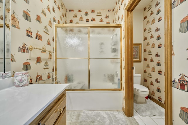 3596 E Montrose Ct, Springfield, MO 65809 - full bathroom with wallpapered walls, vanity, tile patterned floors, toilet, and enclosed tub / shower combo