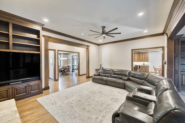 3596 E Montrose Ct, Springfield, MO 65809 - living area with crown molding, ceiling fan, light wood-style flooring, recessed lighting, and baseboards