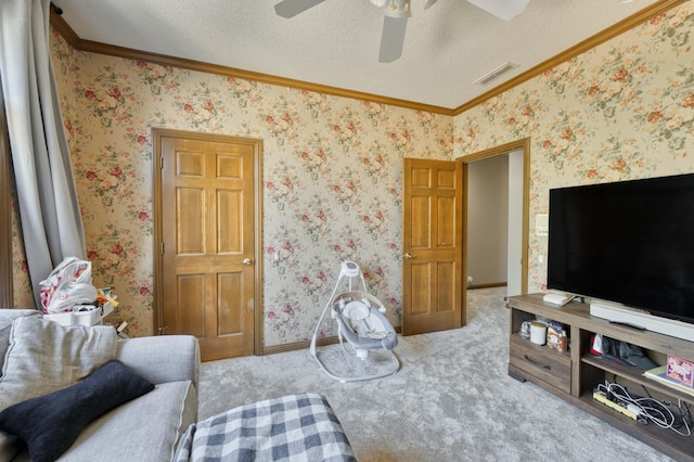 3596 E Montrose Ct, Springfield, MO 65809 - carpeted living area featuring ceiling fan, ornamental molding, a textured ceiling, and baseboards