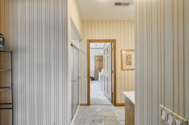 3596 E Montrose Ct, Springfield, MO 65809 - hall featuring wallpapered walls and light colored carpet