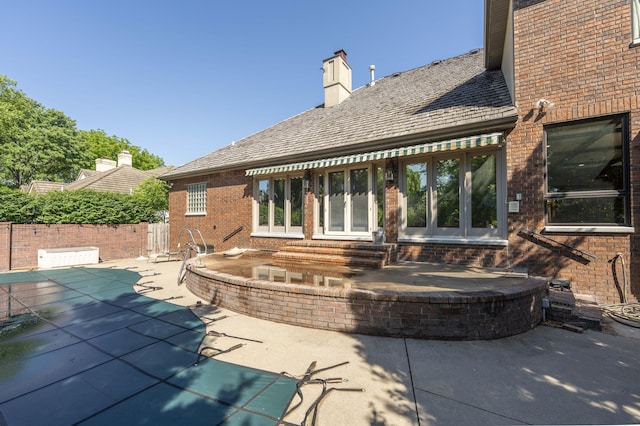 3596 E Montrose Ct, Springfield, MO 65809 - view of patio / terrace featuring french doors