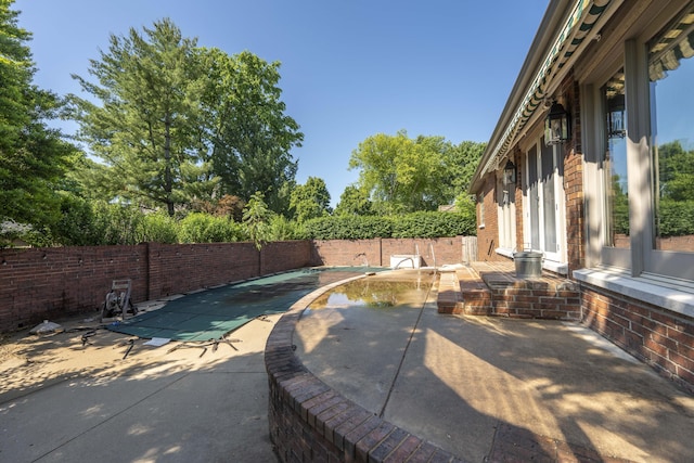 3596 E Montrose Ct, Springfield, MO 65809 - fenced backyard featuring a patio area