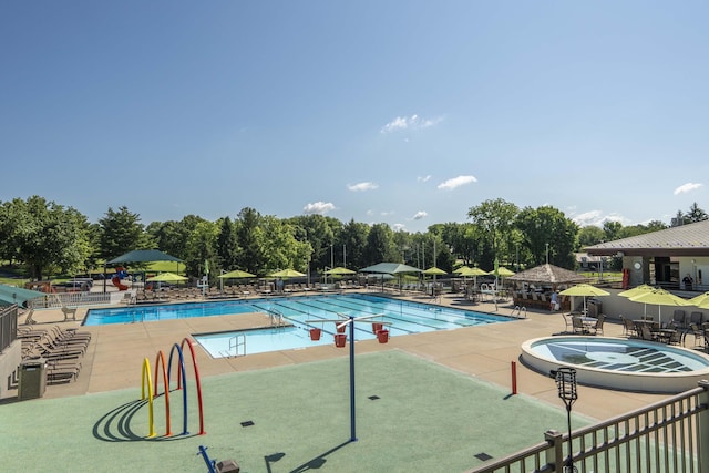 3596 E Montrose Ct, Springfield, MO 65809 - community pool with a patio area and view of wooded area