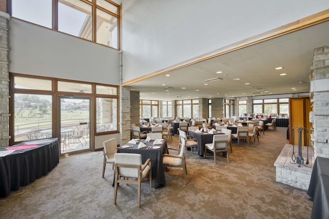 3596 E Montrose Ct, Springfield, MO 65809 - dining room with carpet, recessed lighting, and a high ceiling