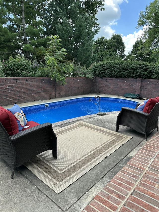 3596 E Montrose Ct, Springfield, MO 65809 - view of swimming pool with a fenced backyard and a patio area