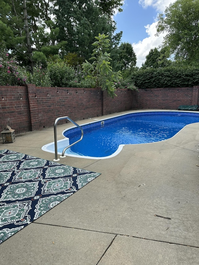 3596 E Montrose Ct, Springfield, MO 65809 - view of swimming pool featuring a fenced backyard and a patio area