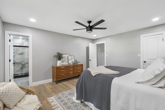 5715 S Clay Ave, Springfield, MO 65810 - bedroom featuring wood finished floors, recessed lighting, baseboards, a ceiling fan, and ensuite bathroom