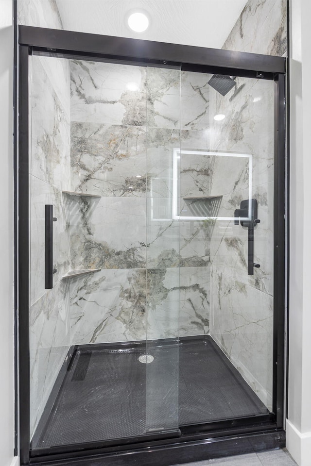 5715 S Clay Ave, Springfield, MO 65810 - full bathroom featuring a marble finish shower