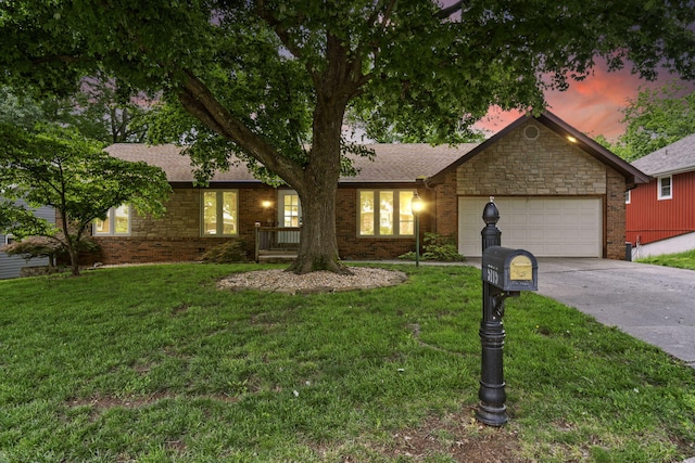 5715 S Clay Ave, Springfield, MO 65810 - ranch-style home featuring a garage, driveway, a yard, and roof with shingles