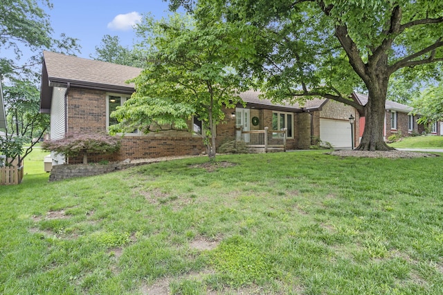 5715 S Clay Ave, Springfield, MO 65810 - view of front facade with brick siding, a garage, a front yard, and a shingled roof