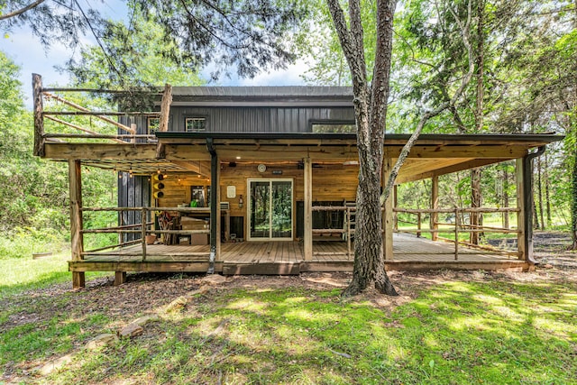 1939 E 540th Rd, Pleasant Hope, MO 65725 - rear view of house with a wooden deck