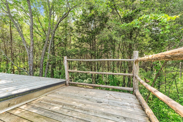 1939 E 540th Rd, Pleasant Hope, MO 65725 - deck featuring a wooded view