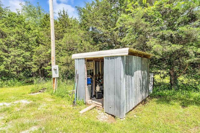 1939 E 540th Rd, Pleasant Hope, MO 65725 - view of shed featuring a view of trees