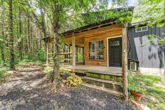 1939 E 540th Rd, Pleasant Hope, MO 65725 - property entrance featuring covered porch