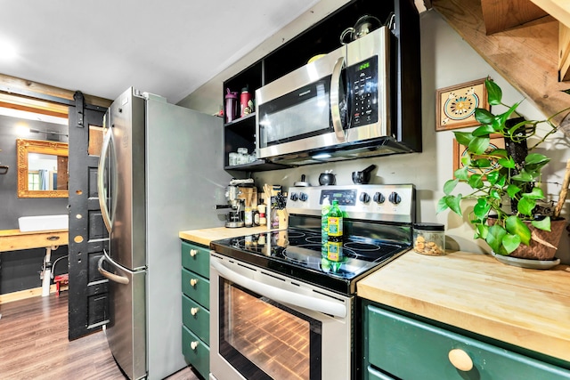1939 E 540th Rd, Pleasant Hope, MO 65725 - kitchen featuring stainless steel appliances, green cabinets, and butcher block countertops