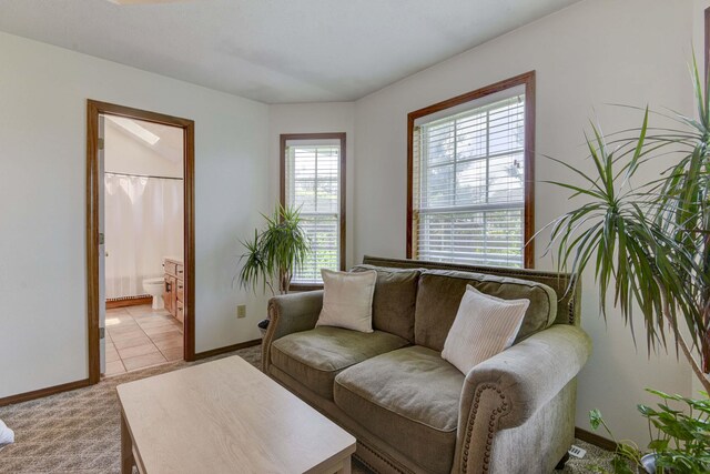 418 E Covington Rd, Willard, MO 65781 - living area featuring baseboards and light carpet